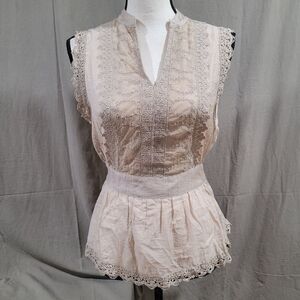 NYE!! Catch my I beige sleeveless lace detail peplum blouse